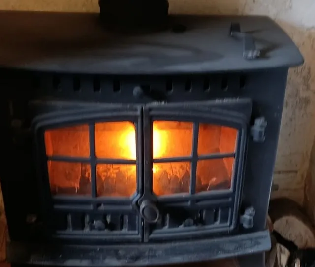 A lit wood burner